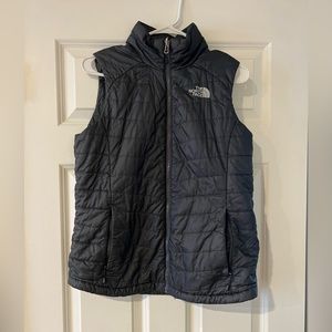 Women’s medium North Face vest.